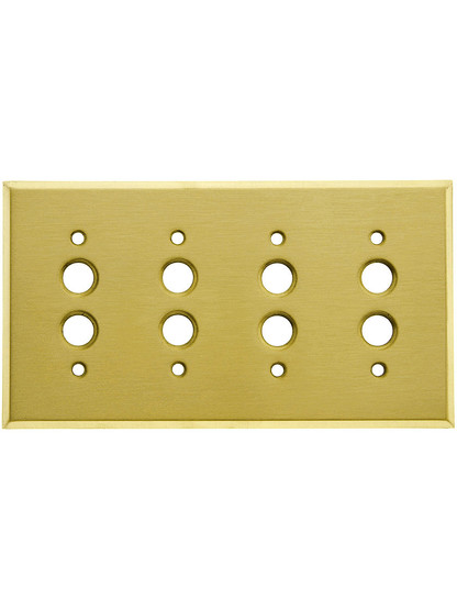 Classic Four Gang Push Button Switch Plate In Satin Brass.